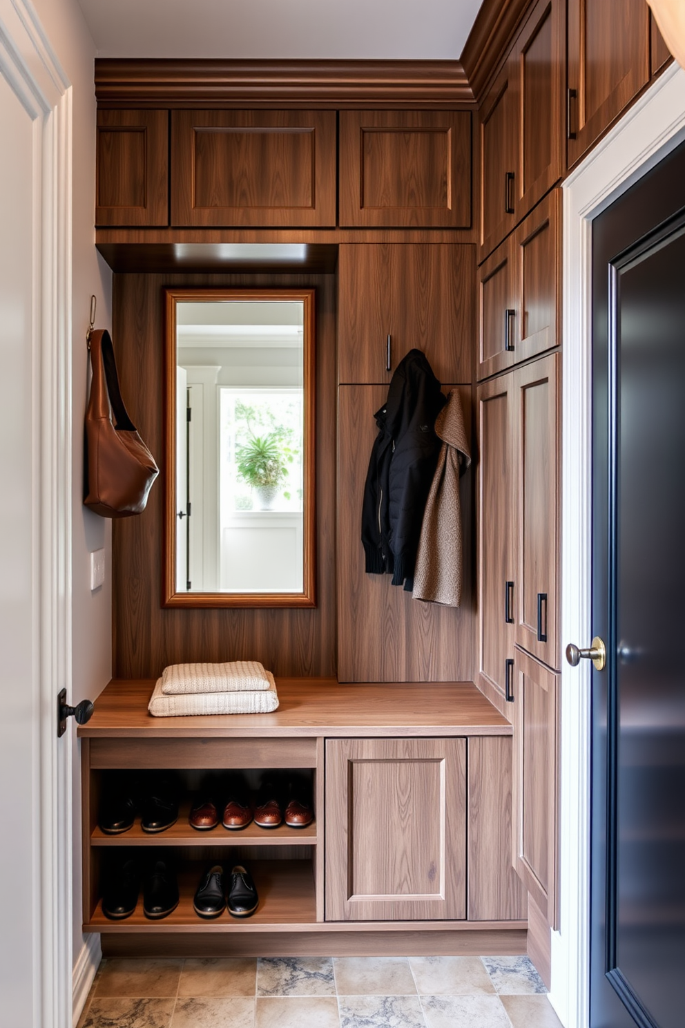 A luxury mudroom designed for functionality and style. The space features custom-built cabinetry with ample storage for shoes and coats, accented by a large mirror that enhances depth and light.