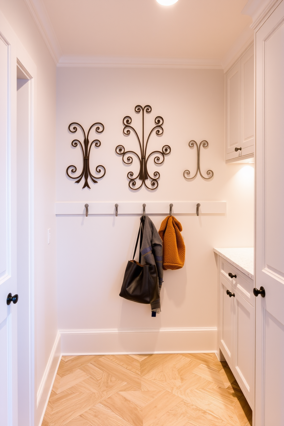 Artistic wall hooks create a unique focal point in a luxury mudroom. The hooks are crafted from high-quality materials and feature intricate designs that blend functionality with style. The mudroom is spacious and well-organized, with custom cabinetry for storage. A combination of elegant flooring and soft lighting enhances the inviting atmosphere of the space.