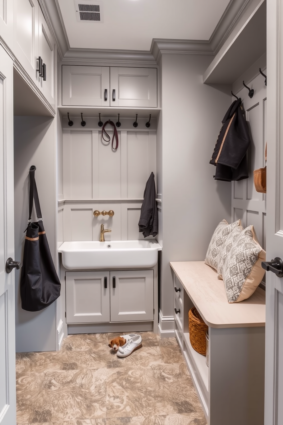 A luxurious mudroom features durable tile flooring that is both stylish and easy to maintain. The space includes built-in storage benches and hooks for coats, creating an organized and welcoming entryway.