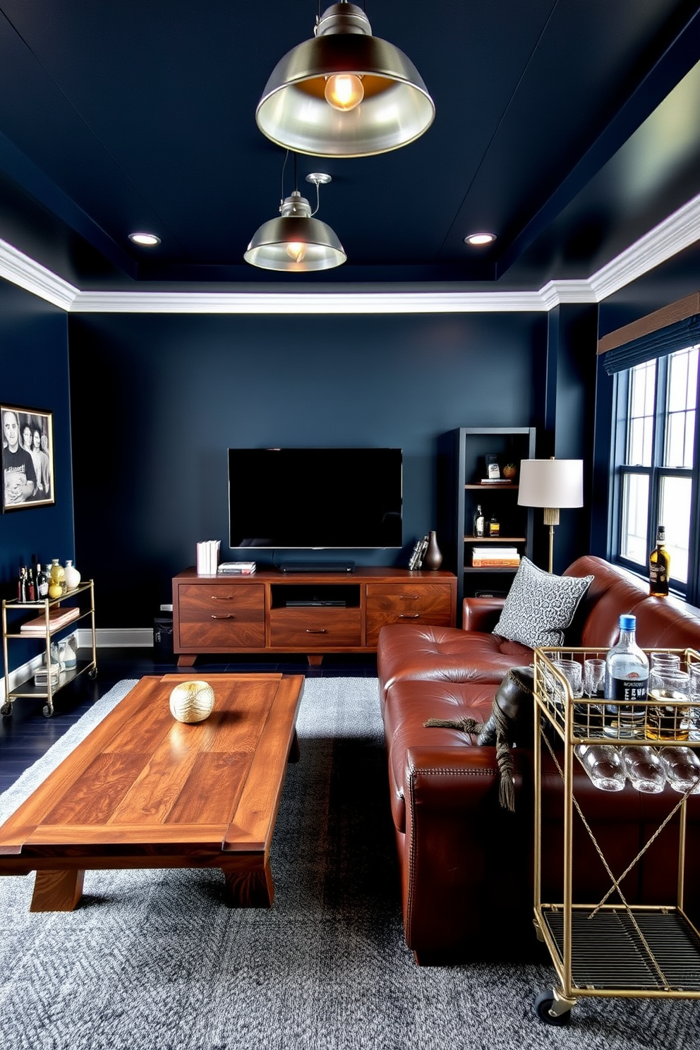 A cozy man cave with a dark color palette featuring deep navy blue walls and charcoal gray accents. The space includes a large leather sectional sofa, a rustic wooden coffee table, and a sleek entertainment unit housing a flat-screen TV. Industrial-style lighting fixtures hang from the ceiling, casting a warm glow over the room. A vintage bar cart in the corner is stocked with spirits and glassware, enhancing the masculine ambiance.