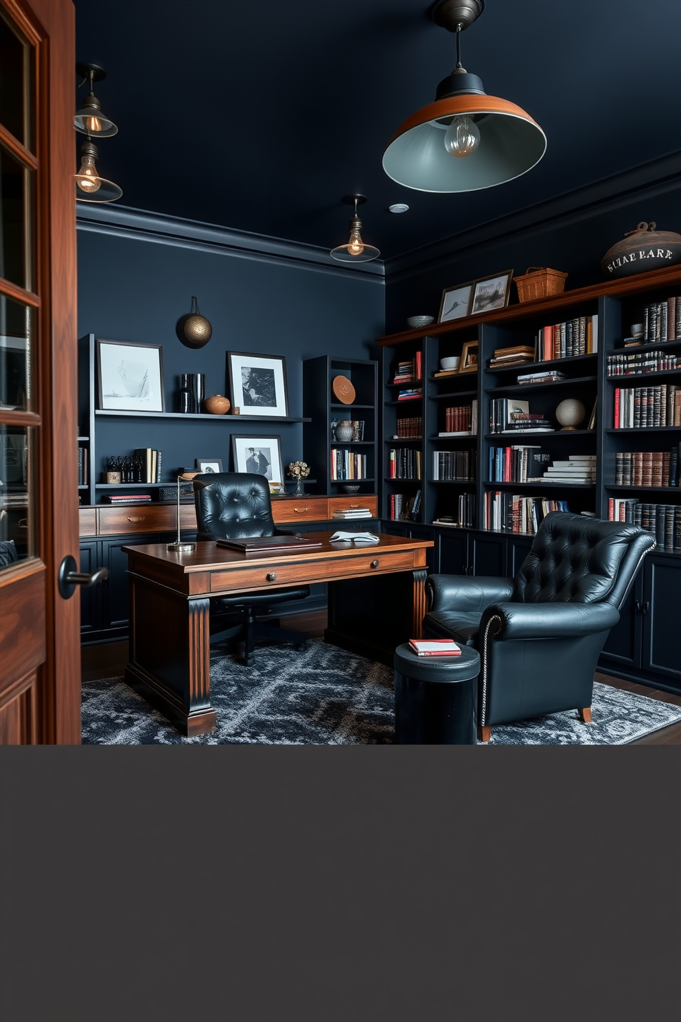 A stylish man cave office featuring a dark color palette with deep navy blue walls and black leather furniture. A large wooden desk with a rich walnut finish is positioned in front of a floor-to-ceiling bookshelf filled with books and decorative items. The space is accented with industrial-style lighting fixtures and a plush area rug in dark gray tones. A comfortable leather armchair sits in the corner, creating a cozy reading nook with a small side table for drinks.