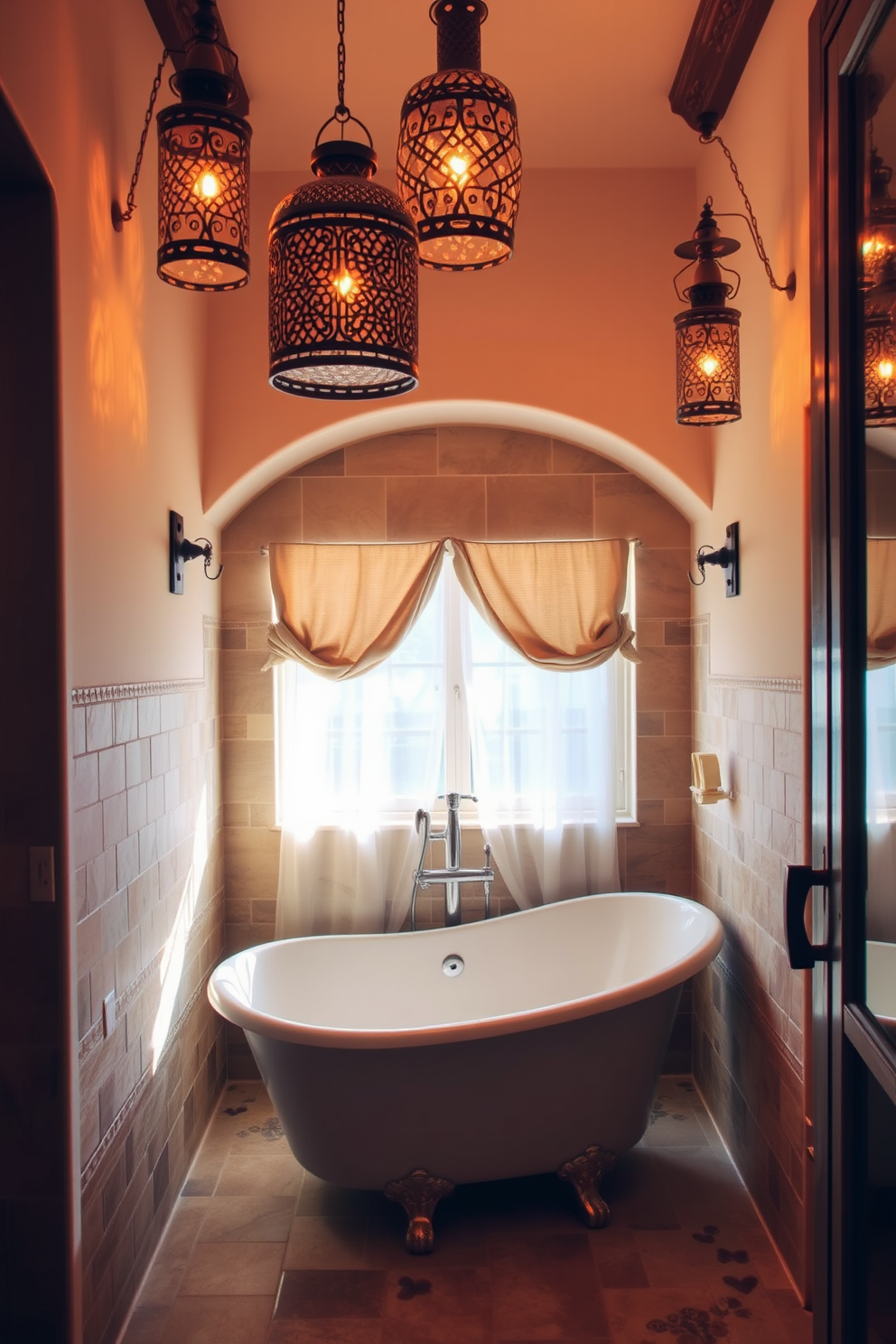 A cozy Mediterranean bathroom setting featuring decorative lanterns that cast soft, warm light throughout the space. The walls are adorned with textured tiles in earthy tones, while a freestanding bathtub sits elegantly beneath a window framed with sheer curtains.