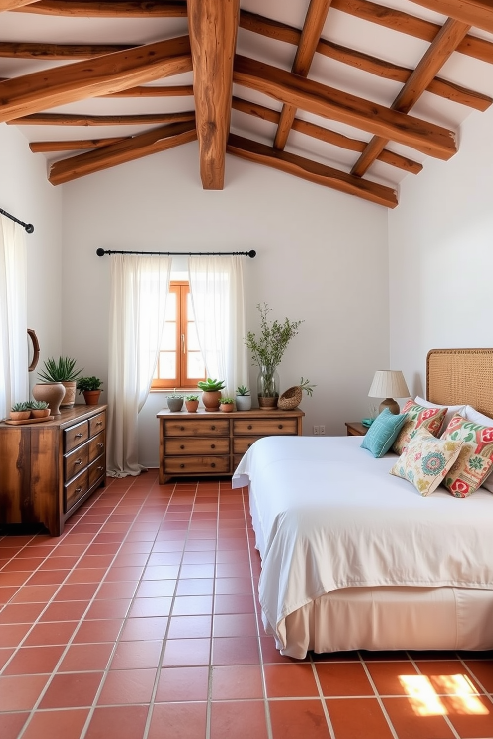 A serene Mediterranean bedroom featuring natural wood beams across the ceiling. The walls are painted in soft white, complemented by terracotta tiles on the floor. A large, plush bed with a woven headboard is adorned with light blue and cream bedding. Decorative pillows in vibrant patterns add a pop of color to the space. A rustic wooden dresser sits against one wall, topped with a collection of potted succulents. Soft, sheer curtains frame the windows, allowing natural light to filter in gently.