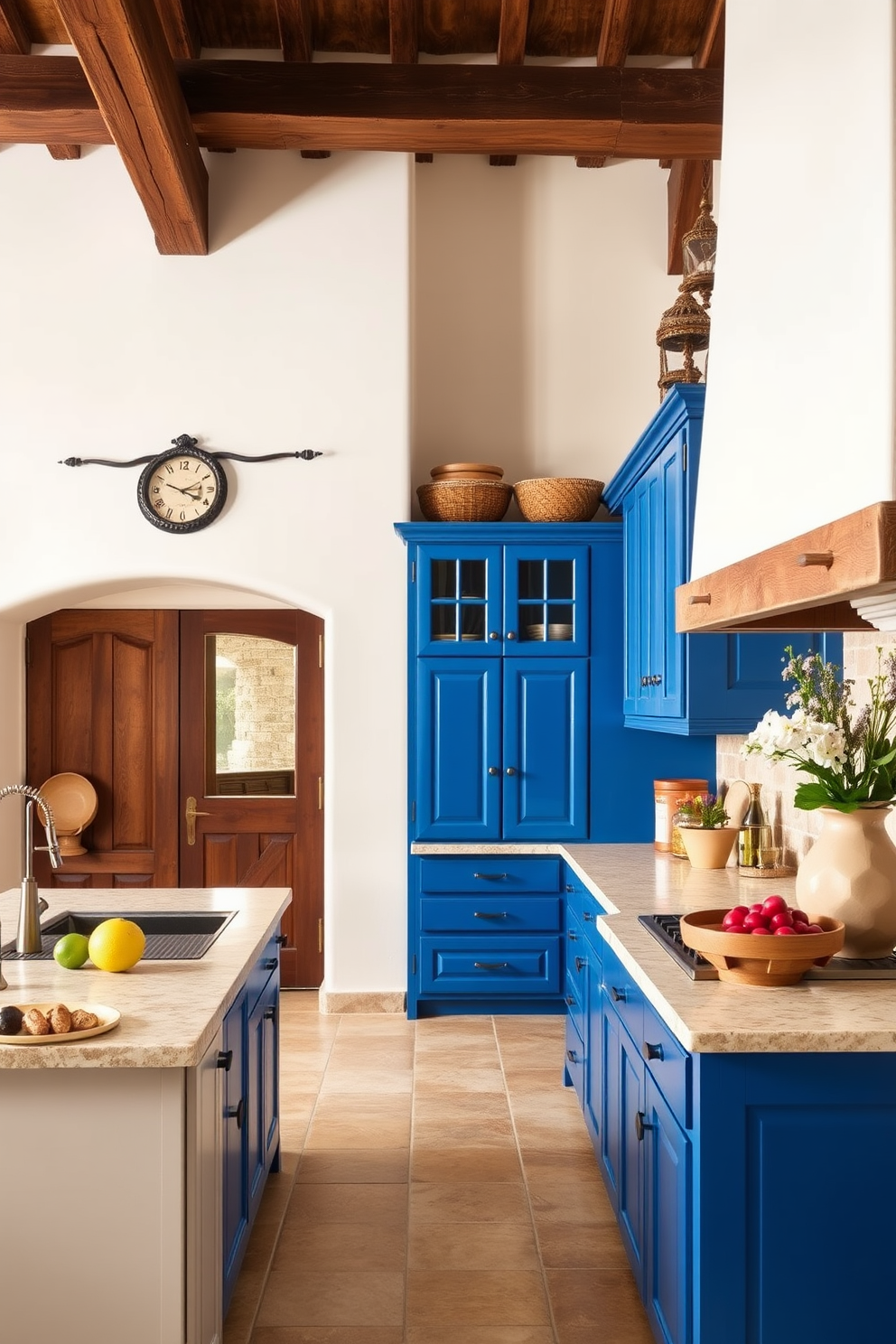 A vibrant Mediterranean kitchen featuring bold blue cabinetry that adds a striking contrast to the warm, earthy tones of the surrounding decor. The space is enhanced by rustic wooden beams overhead and a spacious island topped with a light-colored stone countertop, perfect for gathering and meal preparation.