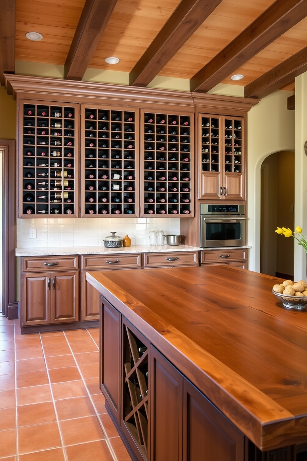 A Mediterranean kitchen featuring built-in wine racks seamlessly integrated into the cabinetry for easy access. The warm color palette includes terracotta tiles, wooden beams on the ceiling, and a large island with a rustic wooden countertop.