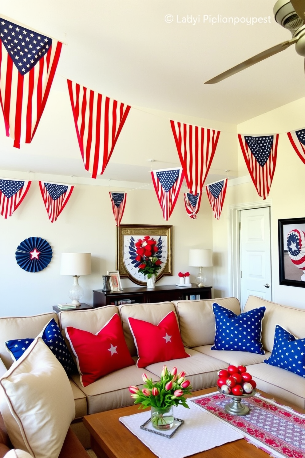 Star spangled banners drape gracefully from the ceiling creating a festive atmosphere. The apartment is adorned with red white and blue accents including throw pillows and table runners to celebrate Memorial Day.