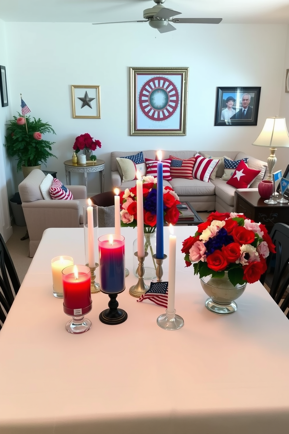 A festive DIY American flag banner decoration is draped across the living room wall, creating a vibrant focal point for Memorial Day celebrations. The banner features alternating red and white stripes with blue stars, adding a patriotic touch to the cozy apartment setting. Colorful throw pillows in red, white, and blue are arranged on a comfortable sofa, enhancing the festive atmosphere. A small table is adorned with a centerpiece of fresh flowers in similar colors, completing the Memorial Day decorating theme.