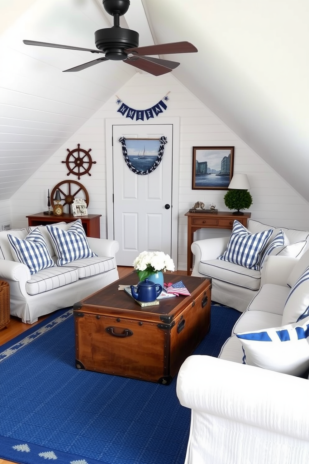 A charming attic space designed with a nautical theme. The walls are painted in crisp white, while blue accents are incorporated through striped throw pillows and a cozy blue area rug. A vintage wooden trunk serves as a coffee table, surrounded by comfortable seating that invites relaxation. Nautical decor such as ship wheels and framed ocean prints adorn the walls, creating a festive Memorial Day atmosphere.