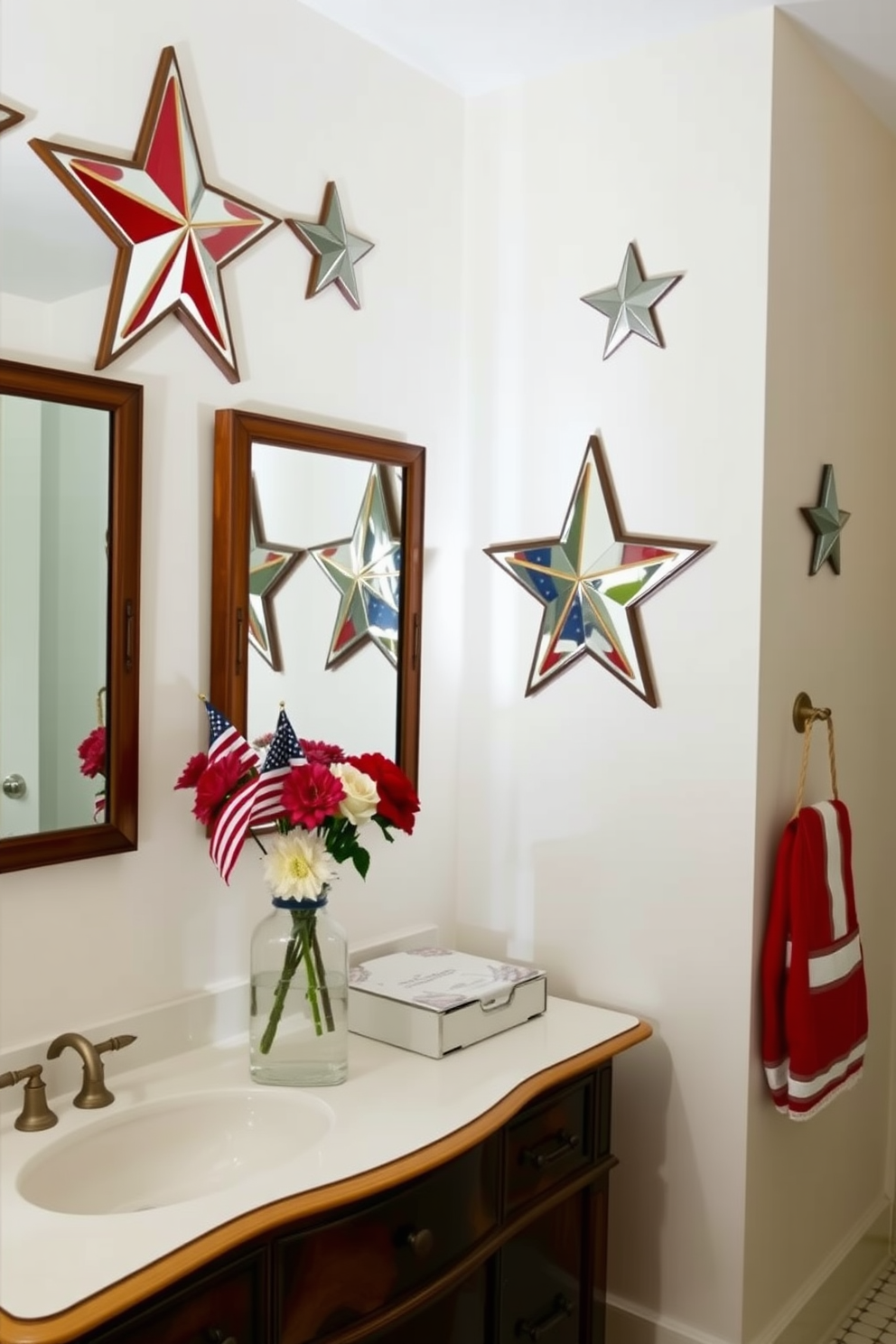 Star shaped decorative mirrors adorn the walls of a festive bathroom, reflecting light and creating a whimsical atmosphere. The mirrors are complemented by red, white, and blue accents, evoking the spirit of Memorial Day. A vintage wooden vanity serves as the centerpiece, topped with a sleek white countertop. Fresh flowers in patriotic colors are arranged in a glass vase, adding a touch of seasonal charm.