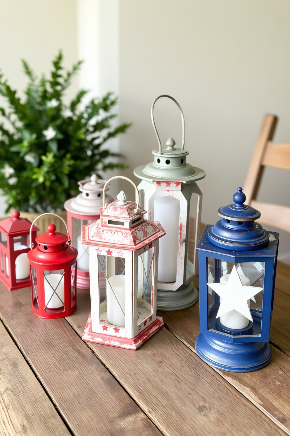 A collection of decorative lanterns in red, white, and blue hues is arranged on a rustic wooden table. The lanterns vary in size and design, creating a festive atmosphere perfect for Memorial Day celebrations.