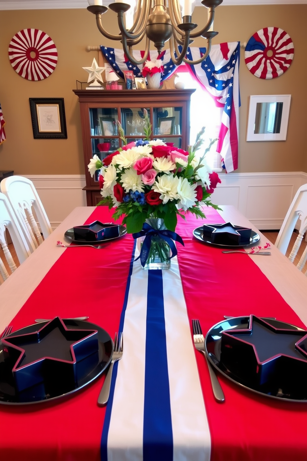 A festive dining room setting for Memorial Day featuring a beautifully set table. The table is adorned with a red, white, and blue tablecloth, and star shaped cookie cutters are placed next to elegant dessert plates. In the center, a vase filled with fresh flowers adds a pop of color. Patriotic-themed decorations are hung on the walls, creating a warm and inviting atmosphere for family gatherings.