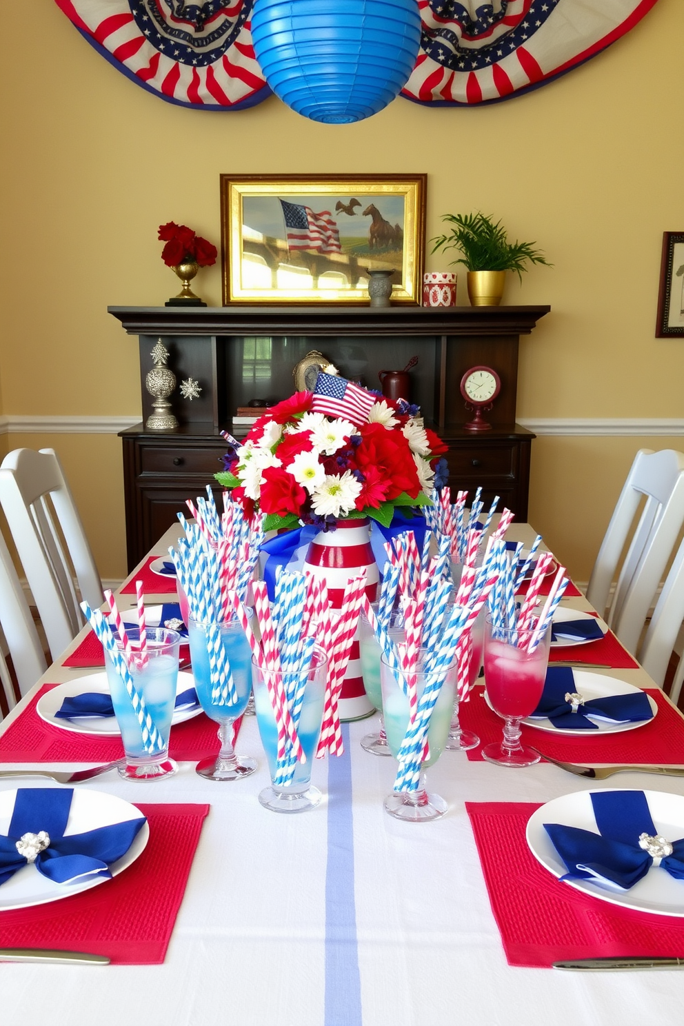 A dining room adorned with seasonal flowers in red, white, and blue hues creates a festive atmosphere for Memorial Day. The table is elegantly set with a crisp white tablecloth, and vibrant floral arrangements are placed in charming vases at the center.