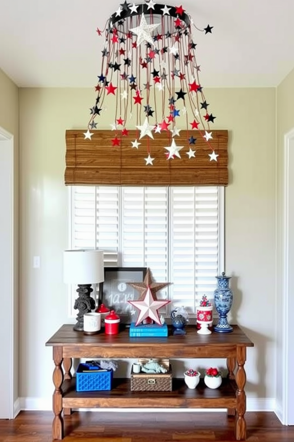 A charming entryway adorned with a handmade star garland that gracefully drapes across the ceiling. Below, a rustic wooden console table showcases a collection of red, white, and blue decorative items, creating a festive atmosphere for Memorial Day.