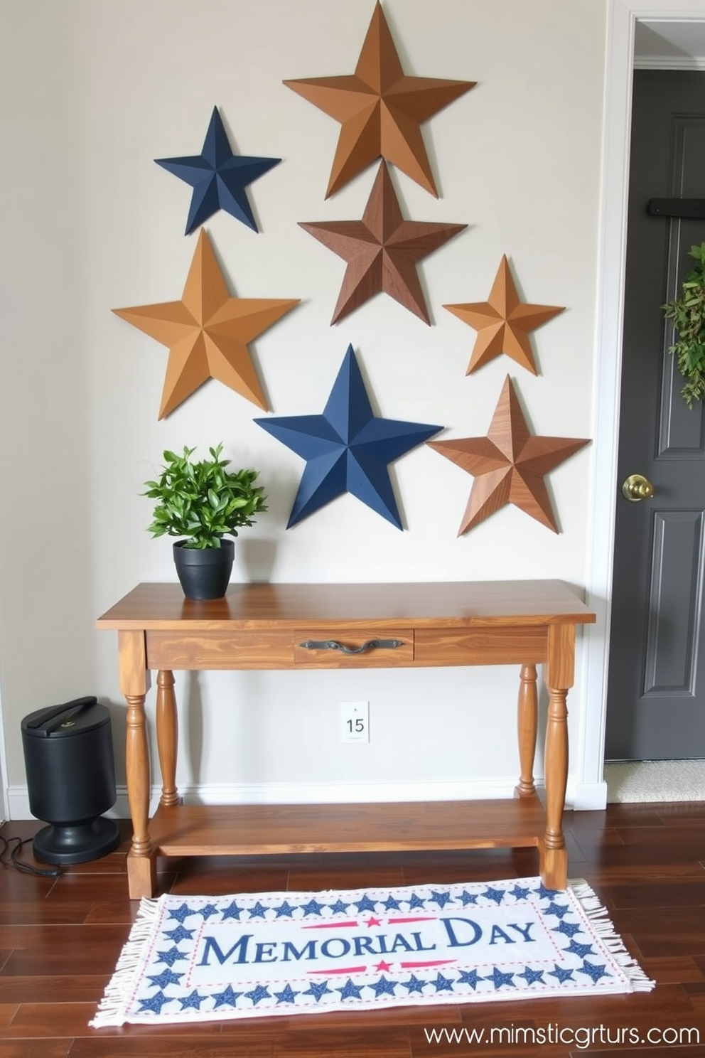 A stylish entryway features a polished wooden entry table adorned with decorative wooden stars in varying sizes. The table is complemented by a small potted plant and a patriotic-themed runner that celebrates Memorial Day.