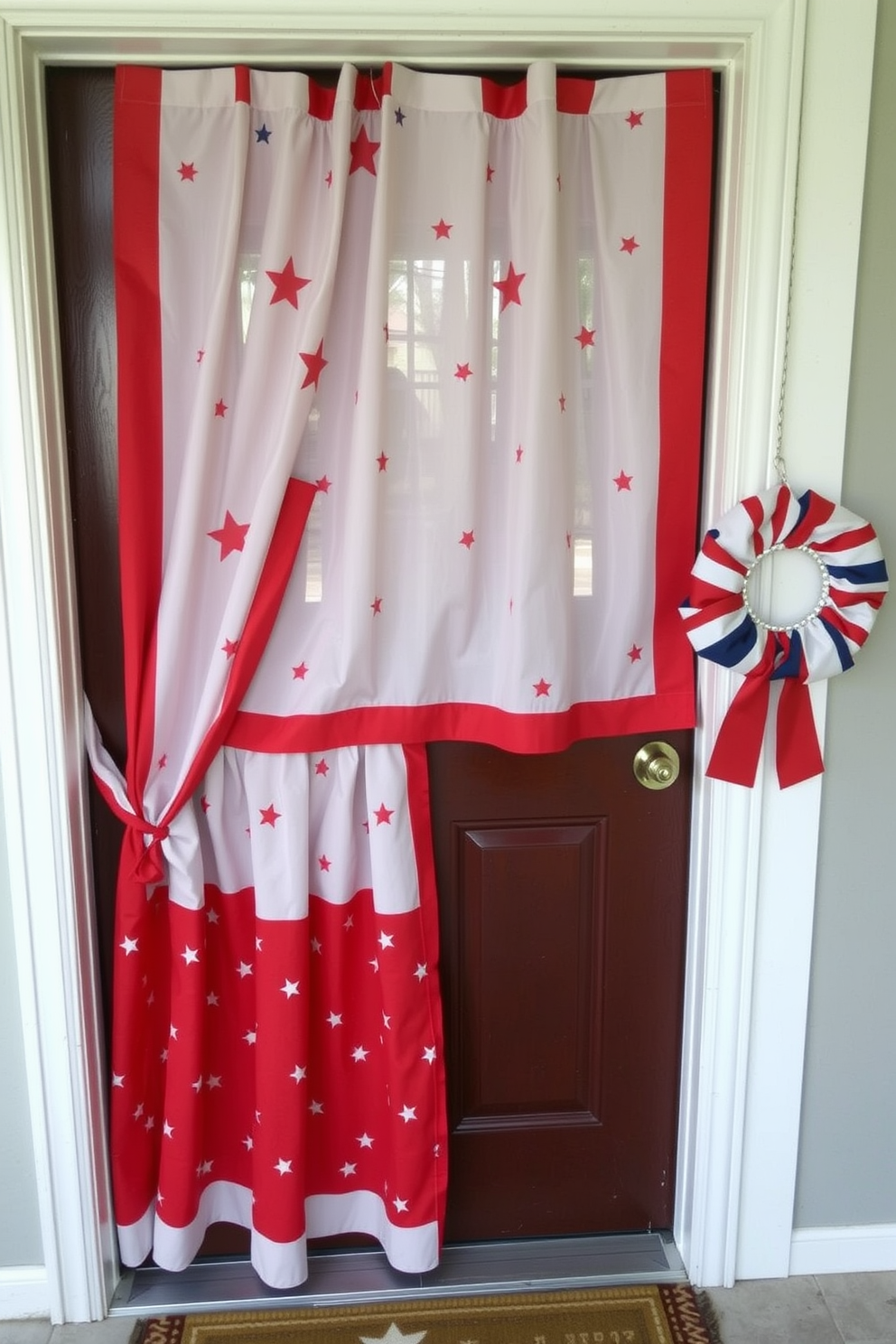 A festive door flag drapes elegantly across the front door, showcasing vibrant red, white, and blue colors that celebrate Memorial Day. Surrounding the door are potted flowers in shades of white and blue, adding a touch of freshness to the patriotic display.