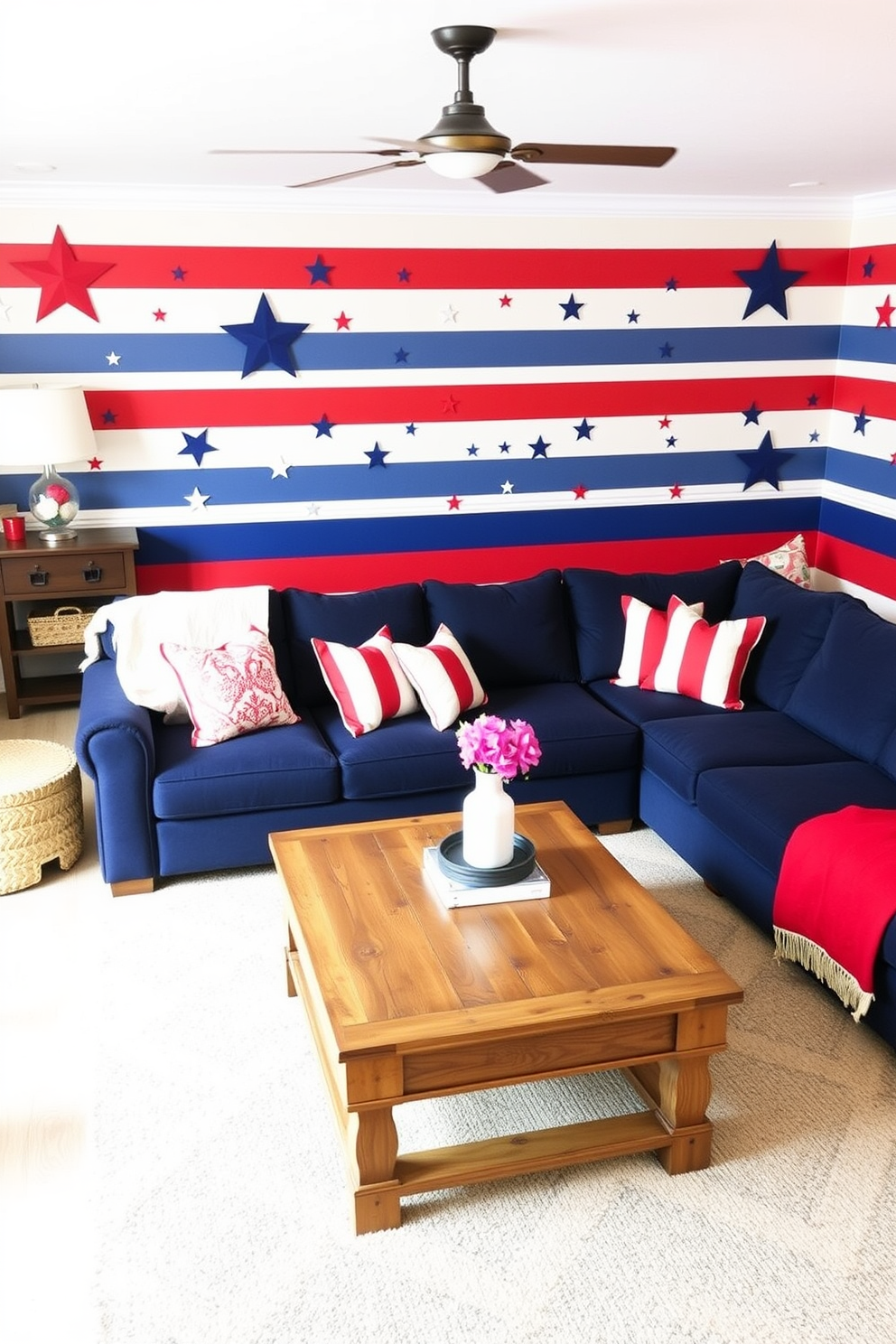 Create a vibrant game room that celebrates Memorial Day with stars and stripes wall decals. The room features a large sectional sofa in navy blue, complemented by red and white throw pillows, and a rustic wooden coffee table at the center.