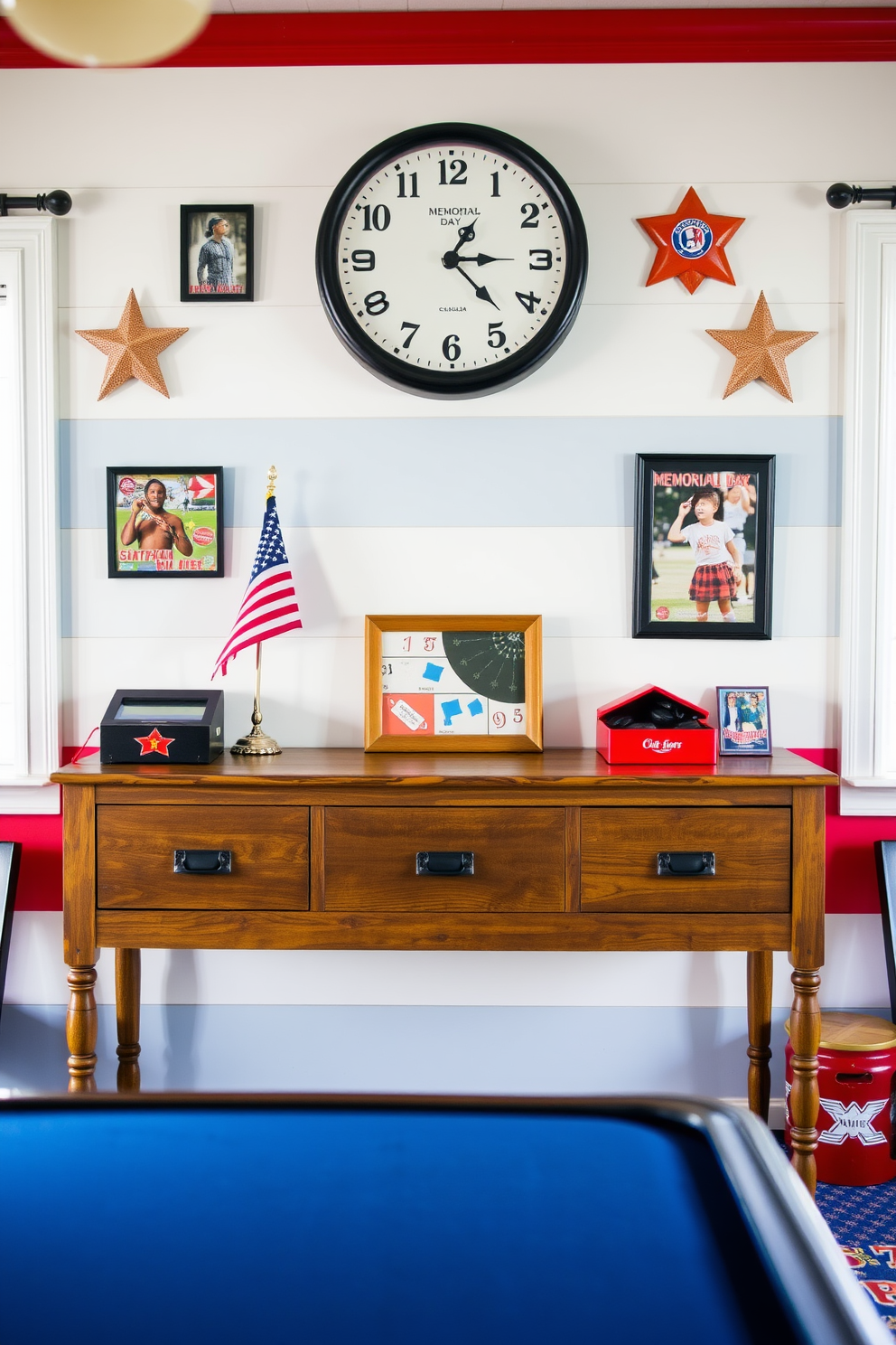 A vibrant game room featuring an American themed wall clock prominently displayed above a rustic wooden console table. The walls are adorned with patriotic colors, and various game memorabilia and framed photos celebrate Memorial Day throughout the space.