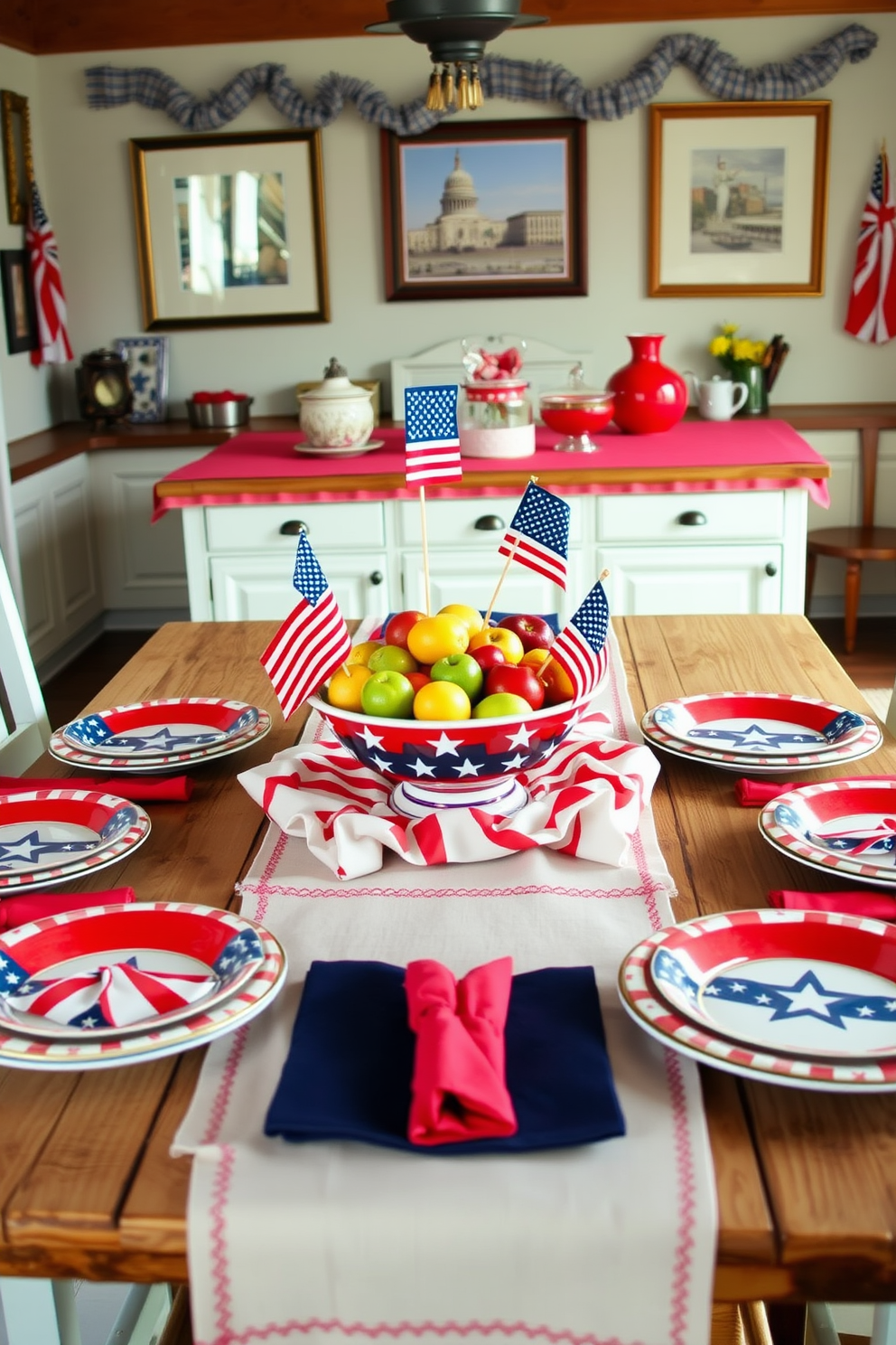 A patriotic themed dishware set is arranged on a rustic wooden table, featuring plates adorned with stars and stripes in vibrant red, white, and blue colors. The centerpiece includes a decorative bowl filled with fresh fruits and small American flags, creating a festive atmosphere. The kitchen is decorated with red and blue accents, including a vintage-style tablecloth and matching napkins. Hanging from the walls are framed images of American landmarks, adding a touch of national pride to the space.