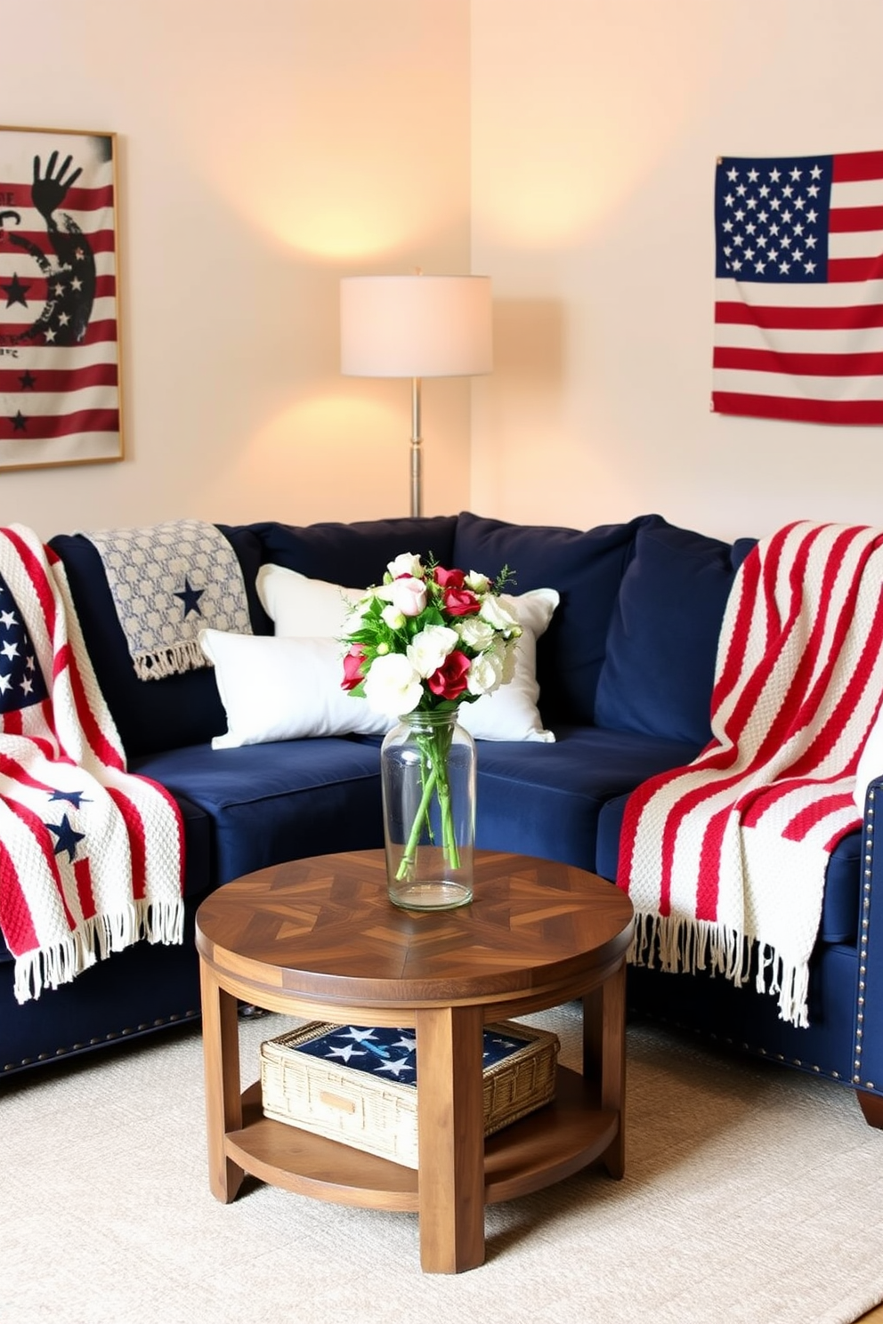 A cozy living room adorned with flag patterned throw blankets that evoke a sense of patriotism. The blankets are draped over a plush navy blue sofa, complemented by white and red accent pillows for a festive touch. The room features a rustic wooden coffee table at the center, adorned with a bouquet of fresh flowers in a glass vase. Soft, warm lighting from a stylish floor lamp creates an inviting atmosphere perfect for Memorial Day gatherings.