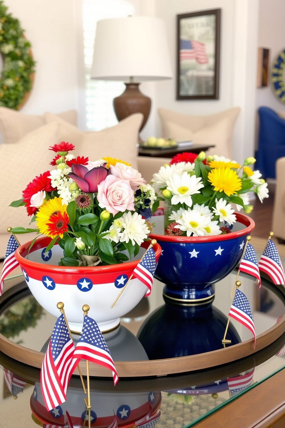 A patriotic themed living room features decorative bowls in red white and blue placed on a coffee table. The bowls are filled with seasonal flowers and surrounded by small American flags to enhance the festive atmosphere.