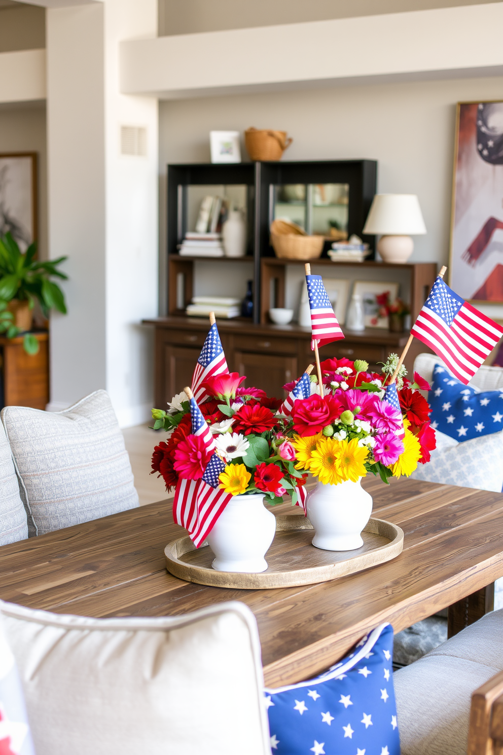 Create a vibrant loft space decorated for Memorial Day. Incorporate creative centerpieces featuring small flags and fresh flowers in a variety of colors. Use a mix of textures and materials to enhance the festive atmosphere. Arrange the centerpieces on a rustic wooden table surrounded by comfortable seating options.