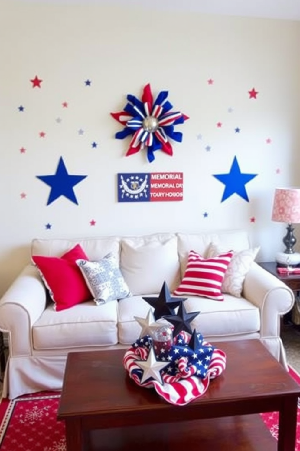 A small living room decorated for Memorial Day features red white and blue wall decals that create a festive atmosphere. The space includes a cozy sofa adorned with patriotic throw pillows and a coffee table topped with a decorative arrangement of stars and stripes.