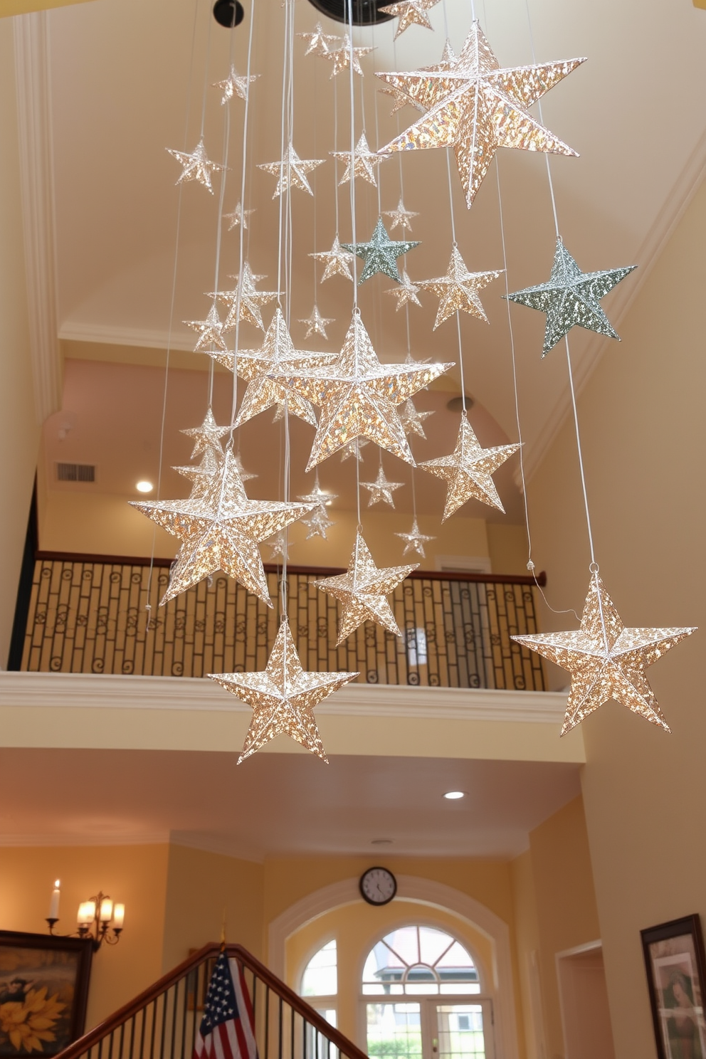 Hanging stars made of shimmering silver and gold materials dangle gracefully from the ceiling above a beautifully designed staircase. The stars vary in size and create a magical ambiance, reflecting soft light and enhancing the festive spirit of Memorial Day celebrations.