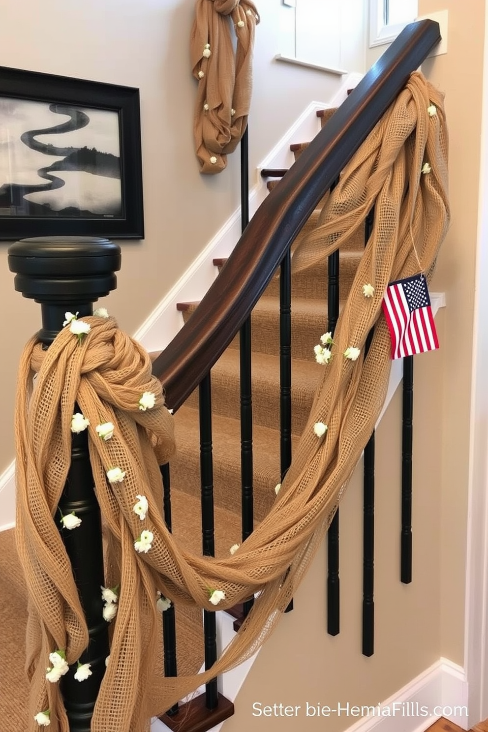 Burlap and twine decorative accents create a rustic and inviting atmosphere. The staircase is adorned with burlap garlands intertwined with twine, featuring small white flowers and miniature flags to celebrate Memorial Day.