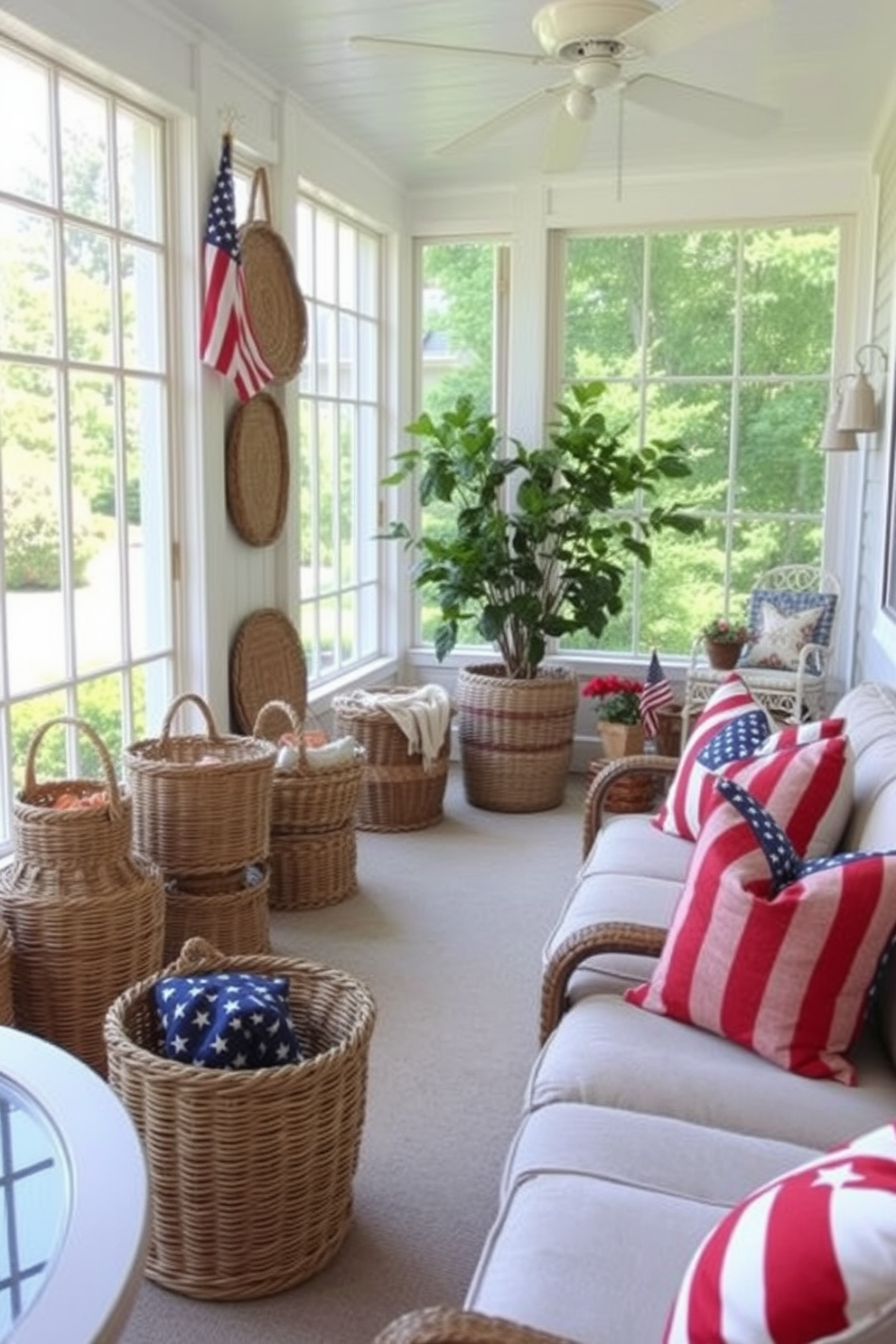 A sunroom filled with natural light featuring woven baskets used for both storage and decor. The baskets are arranged in various sizes around the room, adding texture and warmth to the space. The sunroom is adorned with patriotic decor in celebration of Memorial Day, including red, white, and blue accents. Comfortable seating is positioned to enjoy the view, complemented by decorative pillows that echo the holiday theme.