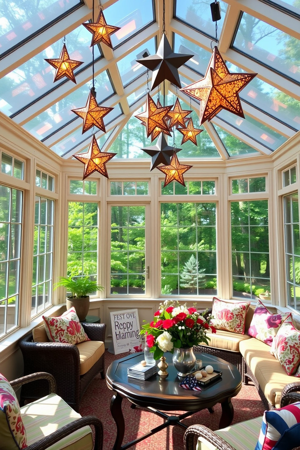 A sunroom filled with natural light, featuring star-shaped lanterns hanging from the ceiling to create a warm ambiance. The decor includes comfortable seating with vibrant cushions and a coffee table adorned with fresh flowers, perfect for a Memorial Day gathering.