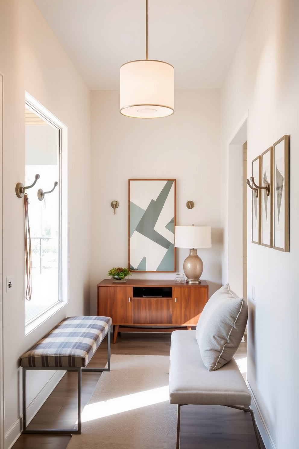 A striking foyer features an accent wall painted in a bold, deep teal that draws the eye. The space is enhanced by sleek Mid Century Modern furniture, including a stylish console table and a geometric mirror that reflects light beautifully.