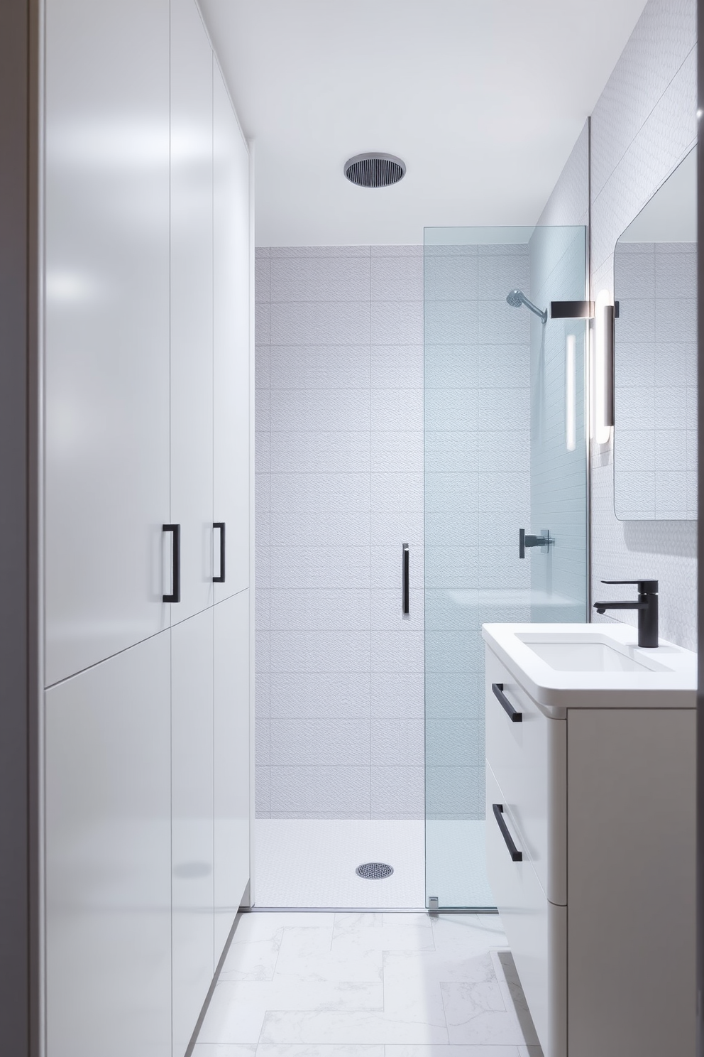 A sleek floating vanity with simple hardware is the centerpiece of this minimalist bathroom. The walls are painted in a soft white, creating a bright and airy atmosphere. Large rectangular mirrors are mounted above the vanity, reflecting the natural light that floods the space. The flooring features large format tiles in a neutral tone, enhancing the clean lines of the design.