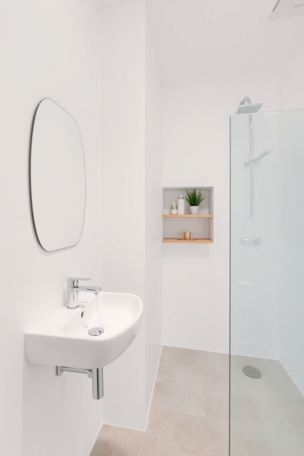 A minimalist bathroom design featuring a sleek wall-mounted sink with a chrome faucet. The walls are painted in a soft white hue, and the floor is adorned with light gray tiles, creating an open and airy atmosphere. In the corner, a glass shower enclosure showcases a modern rain showerhead. Simple wooden shelves hold a few essential toiletries, while a single potted plant adds a touch of greenery to the space.