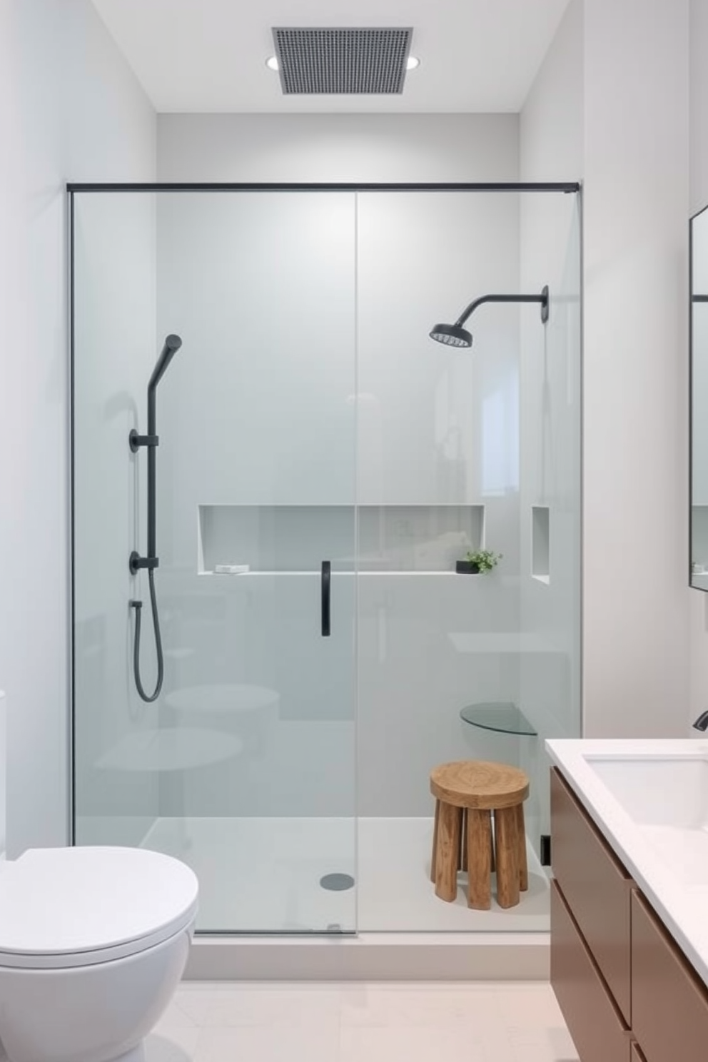 A minimalist bathroom featuring a frameless glass shower enclosure that enhances the sense of openness. The space is adorned with sleek, white tiles and a floating vanity that complements the clean lines of the design.