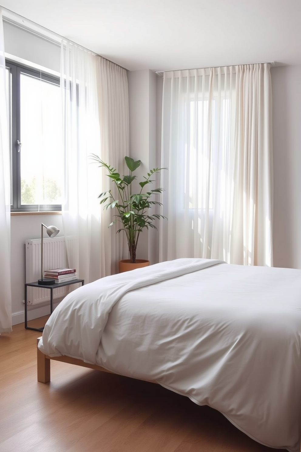 A serene minimalist bedroom featuring a large bed with a simple white duvet and wooden frame. Natural light floods the space through a large window adorned with sheer curtains, enhancing the airy atmosphere. In one corner, a tall potted plant adds a touch of greenery, bringing life to the room. A small bedside table holds a sleek lamp and a few carefully chosen books, maintaining the uncluttered aesthetic.