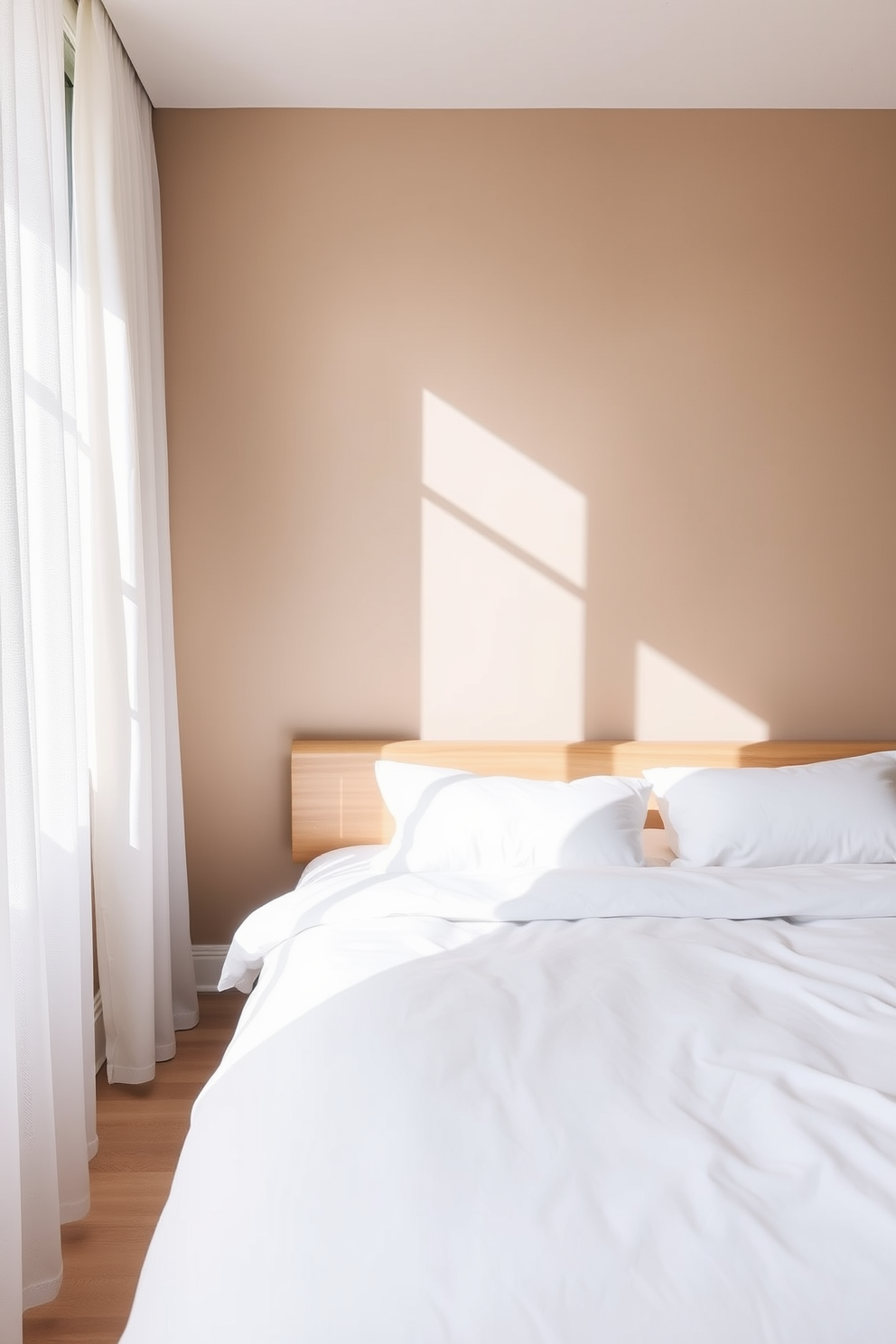 A minimalist bedroom featuring an accent wall in a subtle hue creates a serene atmosphere. The bed is dressed in crisp white linens with a simple wooden headboard, and natural light floods the space through sheer curtains.