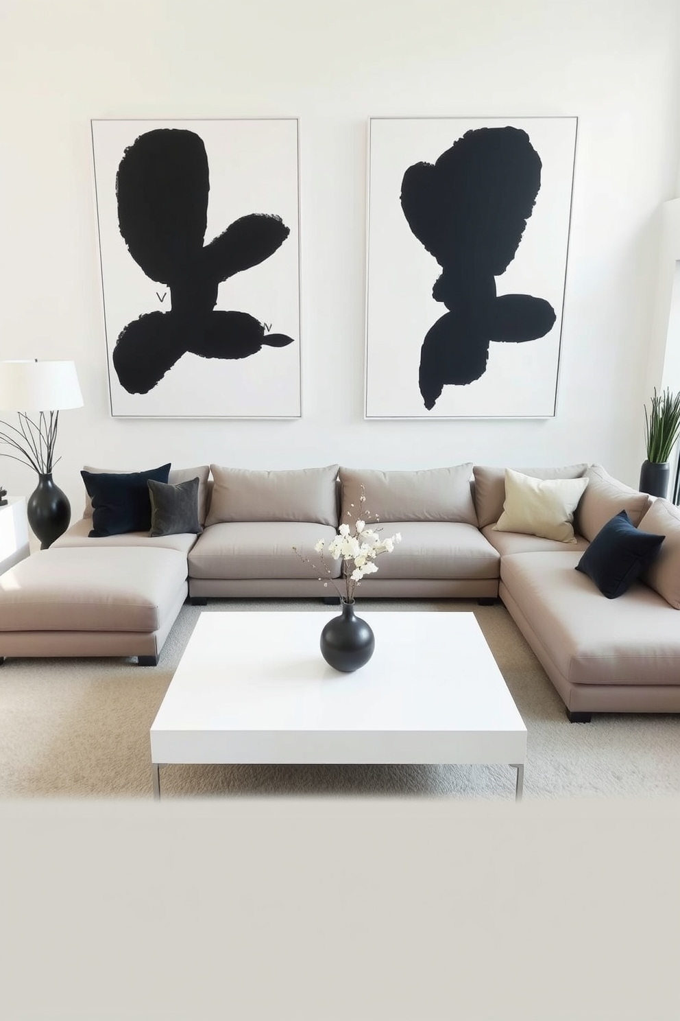 A minimalist family room featuring simple artwork that makes bold statements. The space includes a neutral color palette with a large sectional sofa and a sleek coffee table at the center. On the walls, there are two oversized abstract paintings that draw the eye and add character. A large window allows natural light to flood the room, highlighting the clean lines and uncluttered design.