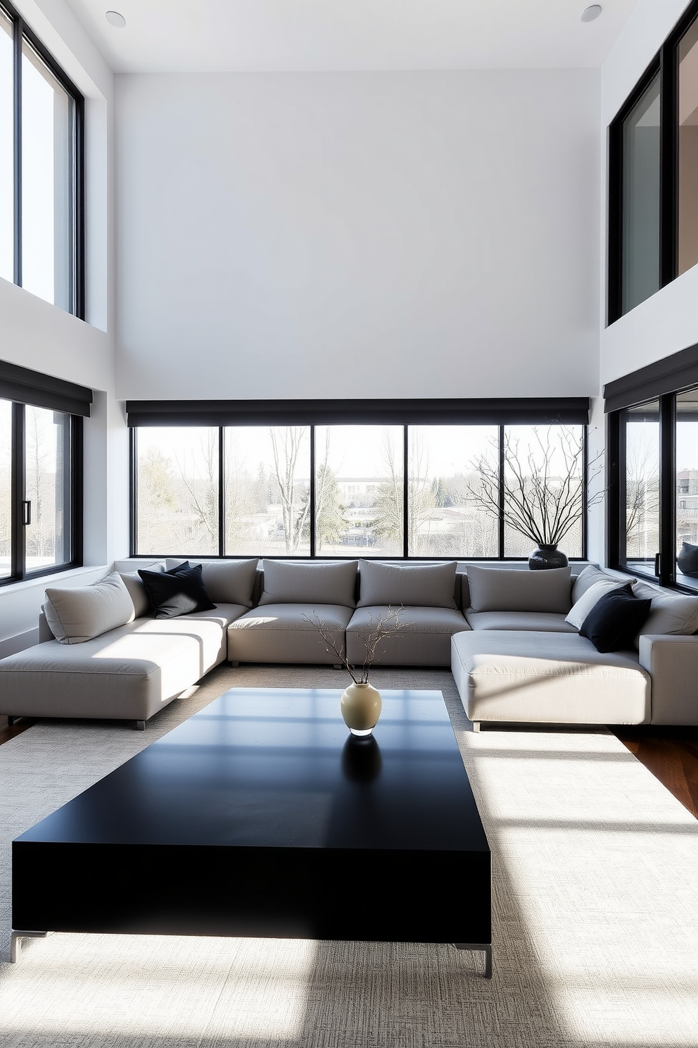 A minimalist living room featuring a sleek statement coffee table at the center, surrounded by a plush sectional sofa in neutral tones. Large windows allow natural light to flood the space, highlighting the clean lines and uncluttered aesthetic of the room.