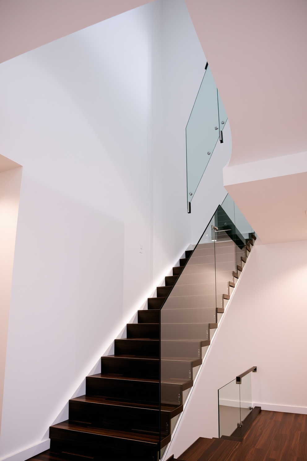 A sleek staircase with integrated lighting illuminating each step creates a modern focal point. The handrail is crafted from brushed stainless steel, complementing the clean lines of the minimalist design. The staircase is surrounded by a bright open space, allowing natural light to flood in from large windows. The walls are painted in a crisp white, enhancing the airy feel of the environment.