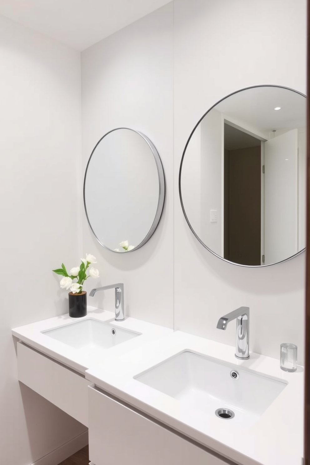 A modern bathroom design featuring round mirrors that soften the sharp angles of the space. The walls are adorned with soft, neutral tones while sleek fixtures and a minimalist vanity enhance the contemporary aesthetic.