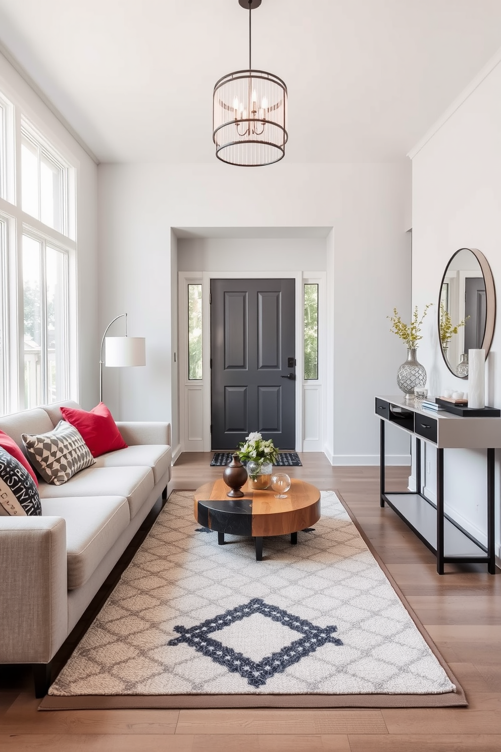 Soft seating area for relaxation. The space features a plush sectional sofa in a light gray fabric, accented with colorful throw pillows. A round coffee table made of reclaimed wood sits in the center, surrounded by a soft area rug that adds warmth. A floor lamp with a sleek design provides ambient lighting, and large windows allow natural light to fill the room. Modern entryway design ideas. The entryway showcases a minimalist console table with a glossy finish, topped with decorative items and a stylish mirror. A geometric patterned runner leads to the door, while a statement pendant light hangs from the ceiling, creating an inviting atmosphere.