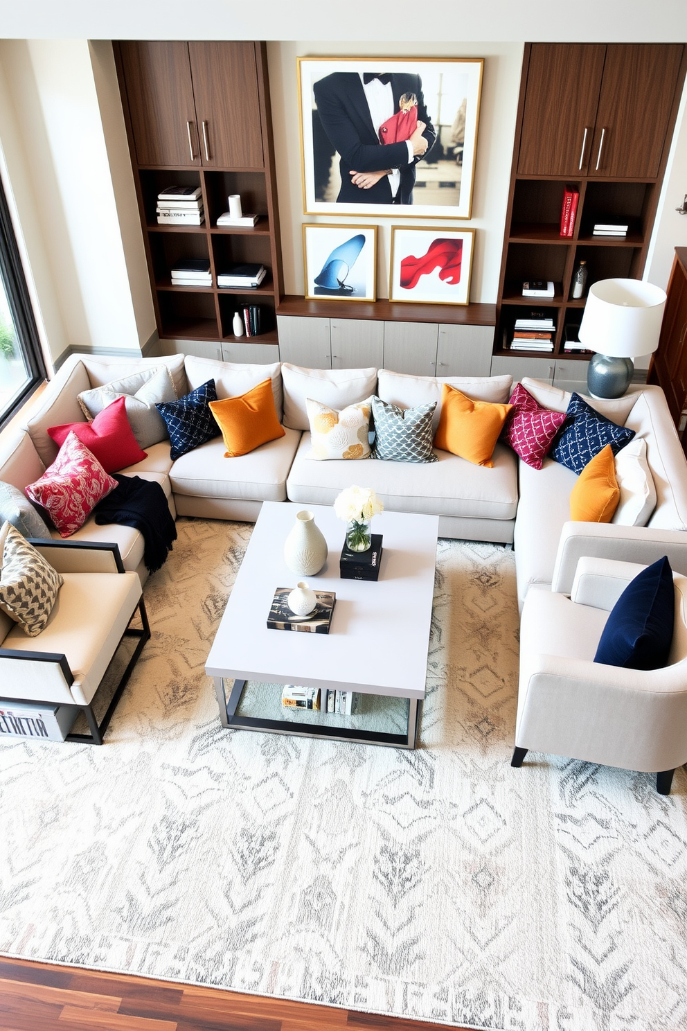 A modern family room features a cozy sectional sofa adorned with colorful throw pillows in various patterns and textures. A large area rug anchors the space, while a sleek coffee table sits in the center, surrounded by stylish accent chairs.