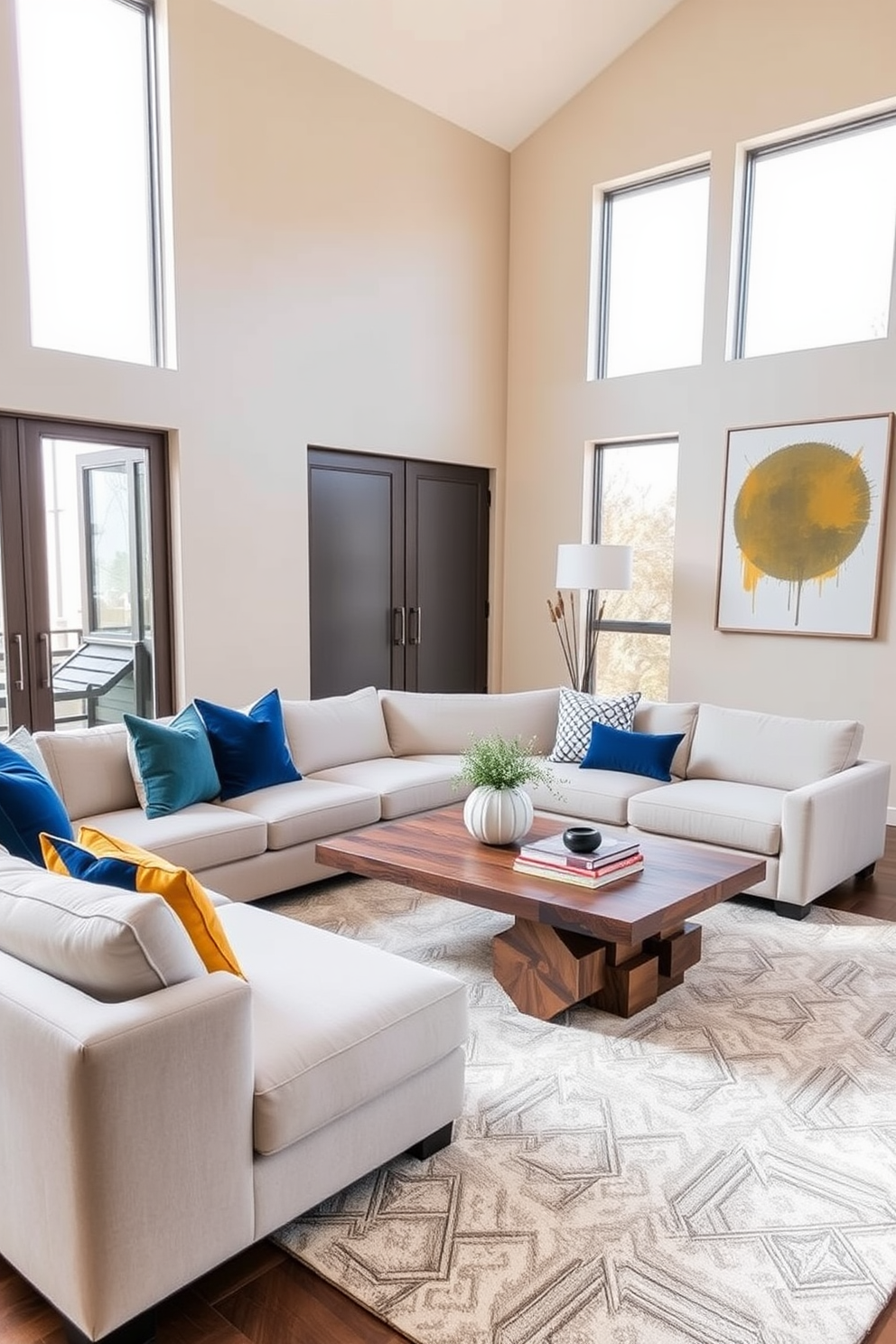 A modern family room featuring a neutral color palette with soft beige walls and a light gray sectional sofa. Bold accents such as vibrant throw pillows in deep blue and mustard yellow add a pop of color to the space. The room includes a sleek coffee table made of reclaimed wood and a large area rug with geometric patterns. Floor-to-ceiling windows allow natural light to flood in, highlighting the minimalist decor and a statement art piece on the wall.