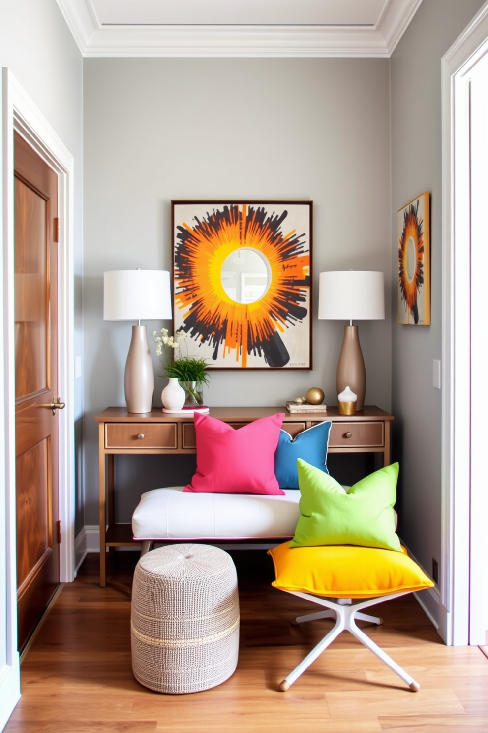 A stylish entryway featuring custom cabinetry designed for optimal organization. The cabinetry includes built-in shelves, hooks for coats, and a bench for convenience. The walls are adorned with a soft gray paint, complementing the warm wood tones of the cabinetry. A large mirror above the bench enhances the space, while a subtle area rug adds texture and warmth.