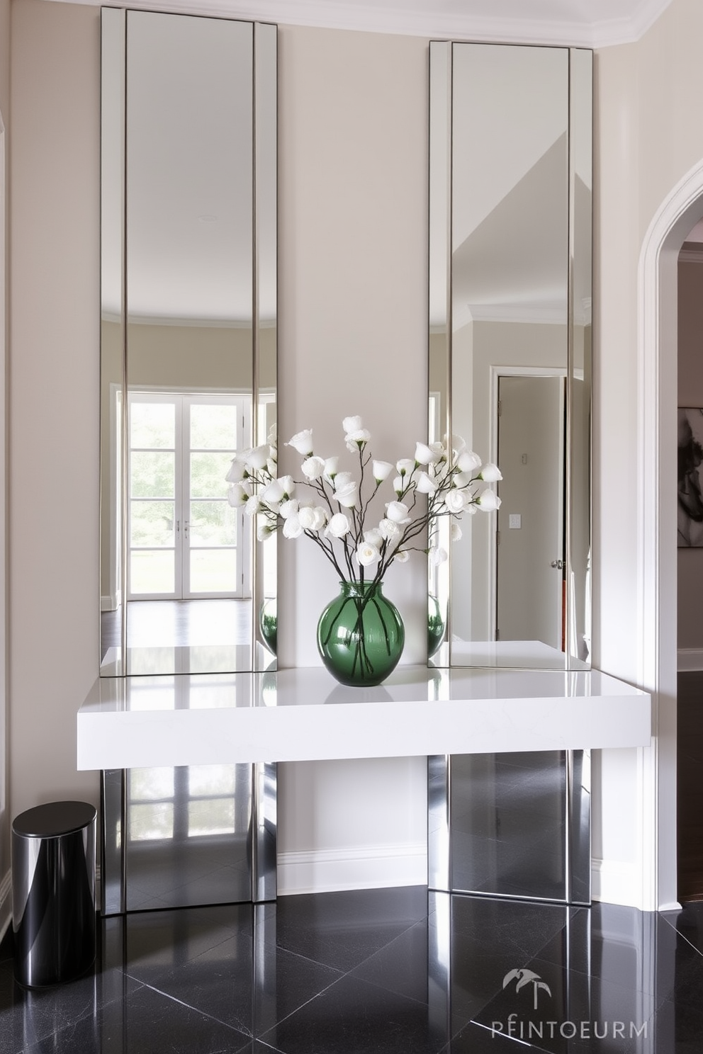 A modern foyer featuring mirrored accents that enhance depth and reflect light throughout the space. The design includes a sleek console table with a glossy finish, flanked by tall, elegant mirrors that create an illusion of spaciousness.