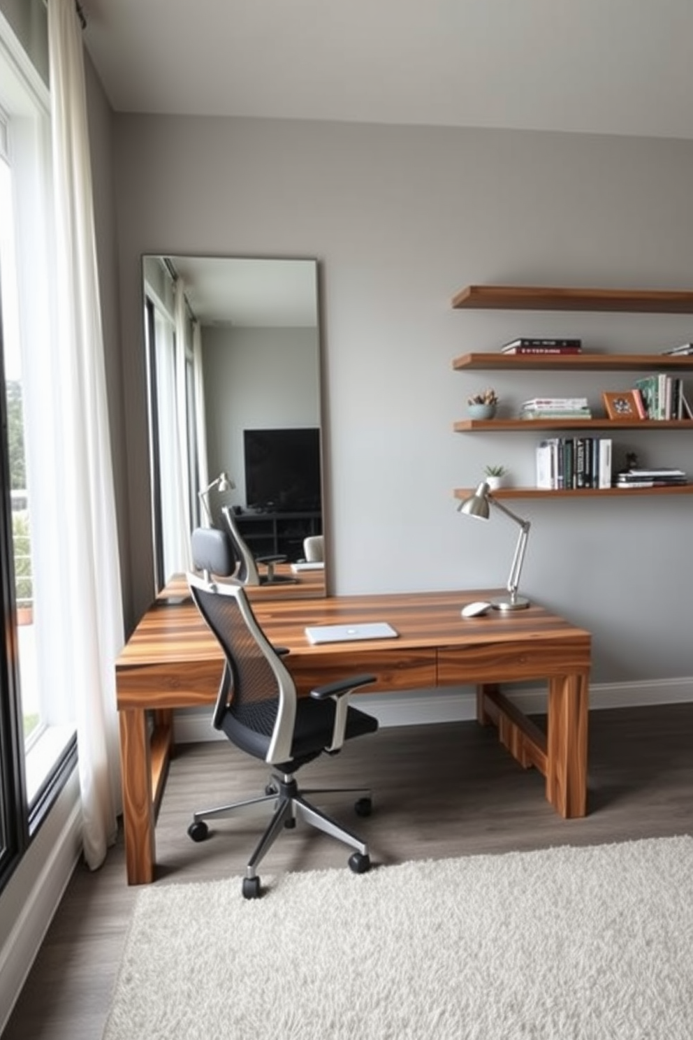 A modern home office features a large desk made of reclaimed wood positioned against a light gray wall. A sleek ergonomic chair complements the desk, while a large floor-to-ceiling mirror reflects natural light from the nearby window, making the space feel larger and more inviting. On the opposite wall, a series of floating shelves display books and decorative items, adding personality to the room. A cozy area rug anchors the space, while a stylish desk lamp provides focused lighting for late-night work sessions.