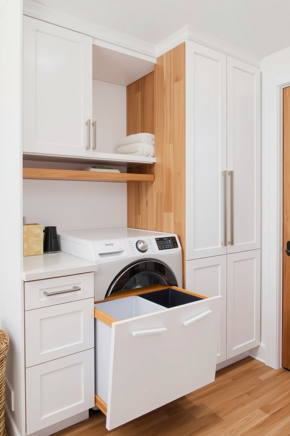 A modern laundry room features a sleek pull-out laundry sorter integrated into a stylish cabinetry system. The space is brightened with white walls and accented by natural wood elements, creating a functional yet inviting atmosphere.