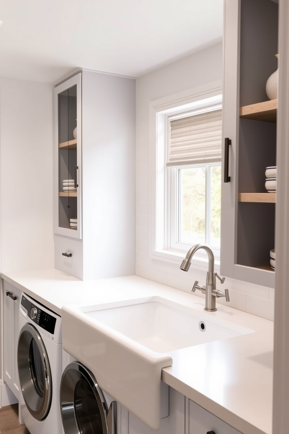 A modern laundry room featuring a farmhouse sink with a sleek faucet for optimal functionality. The cabinetry is painted in a soft white, complemented by natural wood accents and a stylish backsplash in muted tones.