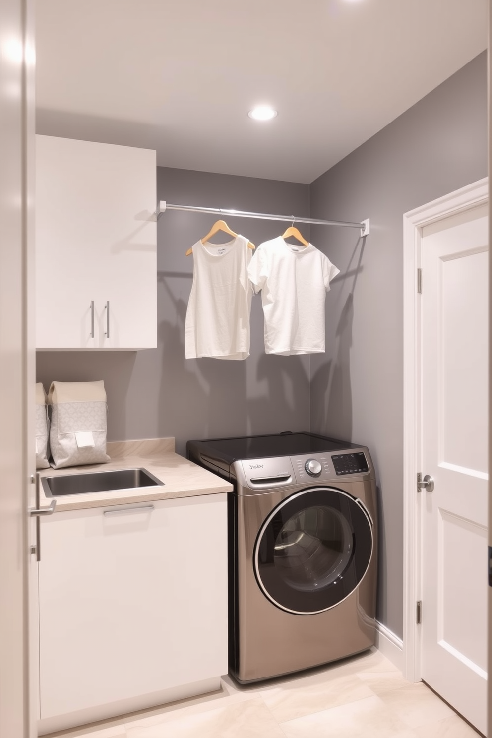 A modern laundry room features a sleek design with a hanging bar installed for drying clothes. The walls are painted in a soft gray hue, complemented by white cabinetry and a stylish countertop for folding laundry.