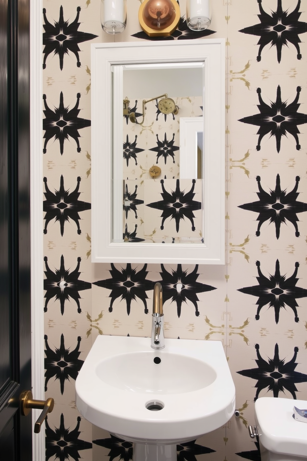 A modern powder room features bold wallpaper adorned with striking geometric patterns. The space is accented with sleek fixtures and a contemporary pedestal sink, creating a stylish and inviting atmosphere.